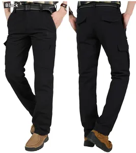 Detail view of black outdoor tactical pants with multi-pockets and a durable canvas belt