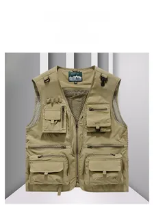Detail view of khaki multi-pocket utility vest with mesh lining and zipper closure