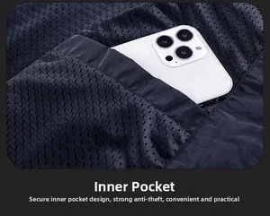 Detail of internal pocket with breathable mesh lining on men's outdoor vest jacket
