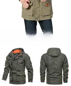 Close-up of military olive green hooded jacket with orange lining and utility pockets