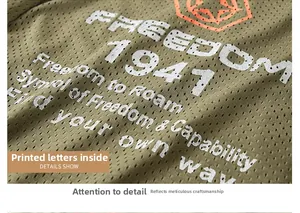 Detail of breathable olive mesh fabric with white printed slogan and orange star icon