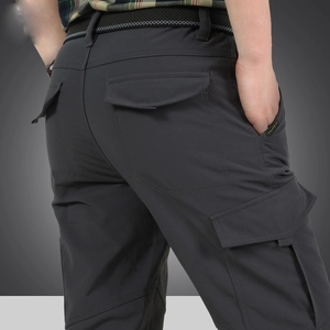 Men's dark gray windproof outdoor tactical pants with multi-pockets and woven belt