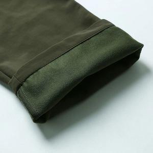 Men's olive windproof outdoor pants with thick warm fleece lining and straight leg cut