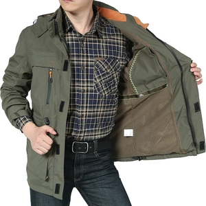 Detail of military green hooded outdoor jacket with breathable mesh lining and pockets