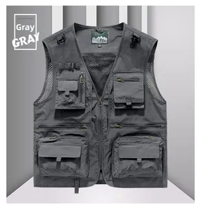 Detail view of breathable mesh side panel and multi-pocket design on outdoor gray vest