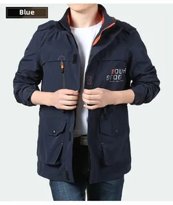 Detail of dark blue hooded cargo jacket with orange contrast lining and chest lettering