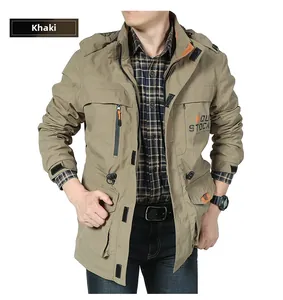 Detail view of khaki outdoor utility jacket with multiple pockets and hood