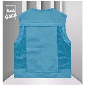 Detail view of the sky blue breathable mesh back and large zipper pocket on the utility vest
