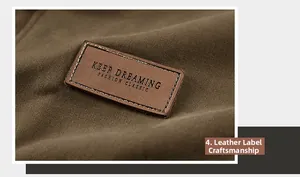 Close-up of leather patch with Keep Dreaming embossing on N1 deck jacket fabric