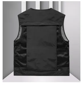 Rear view of black functional vest featuring large mesh panels and back zipper pocket
