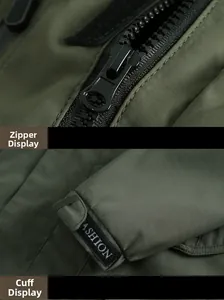 Detail of army green outdoor jacket featuring black resin zipper and velcro fashion cuffs