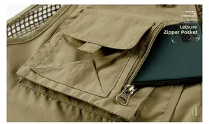 Macro detail of breathable mesh shoulder and multi-layer tactical pockets with zippers