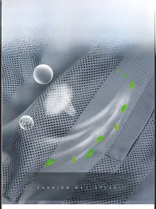 Close-up of gray breathable mesh fabric showing honeycomb structure for ventilation