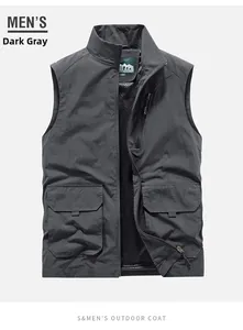 Detail view of dark grey fishing vest featuring breathable mesh lining and zipper pockets