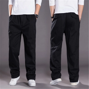 Men's loose fit cotton casual pants in black featuring elastic waist and straight leg cut