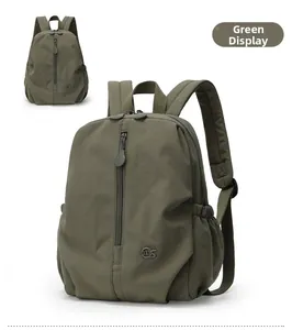 Detail of army green textured travel backpack with vertical zip pocket and mS logo