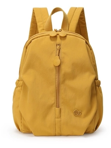 Minimalist mustard yellow waterproof nylon backpack for travel and outdoor sports