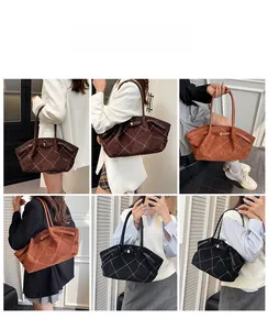 Quilted tote bag in coffee, tan, and black shown in various shoulder carry styles