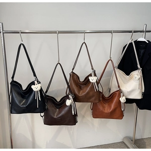Five colors of retro tote bags in black, brown, and beige with cute bear charms