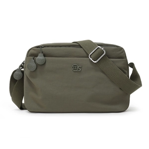 Detail view of olive green nylon crossbody bag with multi-zip pockets and adjustable strap
