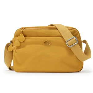 Detailed front view of bright yellow multi-pocket nylon crossbody bag with MS logo