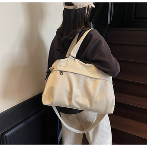 Borsa da viaggio beige capiente con doppi manici e ricamo NINGJIA sul davanti
