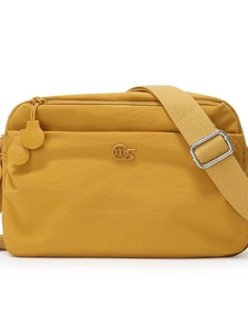 Yellow nylon shoulder bag with multi-layer zippers and adjustable woven strap
