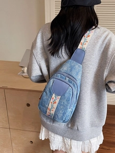 Vintage blue denim crossbody chest bag with floral embroidery and wide strap