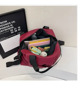 Internal view of a large red travel backpack showing organized compartments and storage capacity