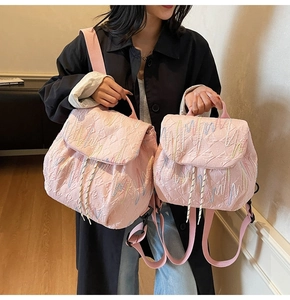 Pink quilted backpack set showing size comparison between large and small variants
