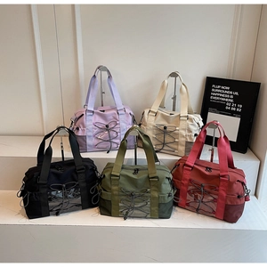 Multi-color lightweight travel tote bags with transparent compartments and side pockets