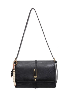 Retro black shoulder bag with gold metal clasp and colorful beaded pendant detail