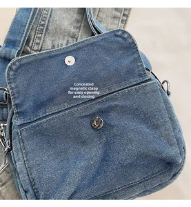 Close-up of the hidden magnetic buckle and denim fabric on this casual crossbody bag