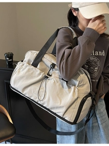 Beige large capacity nylon travel bag with shoulder strap for sports and gym