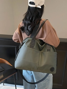 Olive green large capacity travel backpack with waterproof fabric and adjustable straps