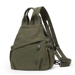 Army green multi-compartment canvas backpack with side pockets and adjustable straps