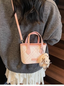 Pink and white checkered mini tote bag with adjustable shoulder strap and plush bear charm