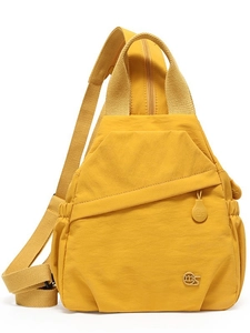 Elegant mustard yellow nylon crossbody chest bag with adjustable strap and metal logo