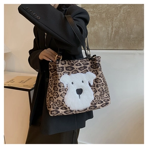 Leopard print tote bag featuring a white plush dog patch and spacious interior style