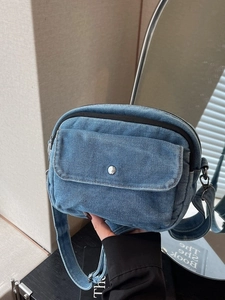 Minimalist blue denim square crossbody bag with silver button and adjustable strap