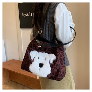 Leopard print tote bag with large plush dog patch shown on model for size and fit