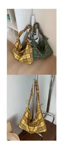 Detail of scrunchie handle on vintage plaid canvas tote bag with soft pleated texture