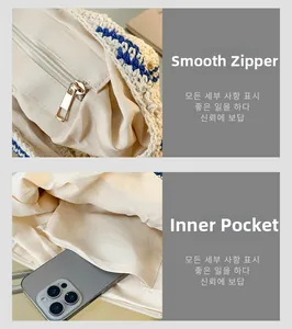 Detail of smooth metal zipper and internal pocket of the beige woven shoulder bag