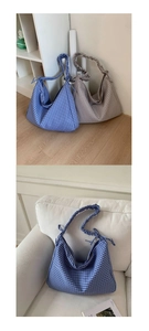 Detail of checkered canvas tote bag with ruffled strap and side bow tie decoration