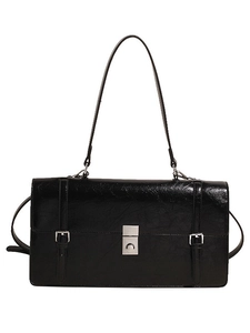 Minimalist black faux leather underarm shoulder bag with silver buckle on white background