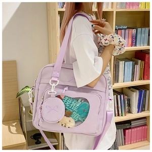 Lavender canvas ita bag with heart window and cute plush doll decoration detail