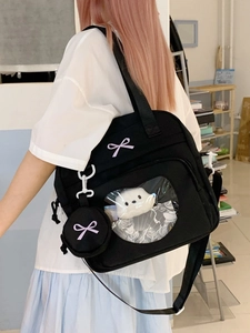 Black canvas ita bag with large clear window and purple bow decoration for charms