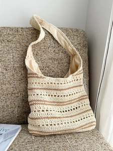 Chic beige and brown striped crochet hobo bag with hollow weave and shoulder strap