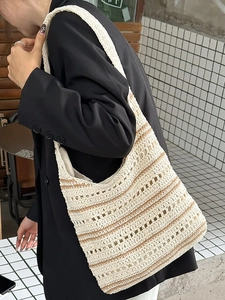 Women's hollow woven shoulder bag with chic striped design for fall/winter style