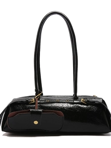 Retro black leather tote bag with long shoulder straps and matching mini pouch